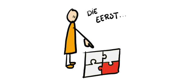 er ligt een puzzel van vier stukken op de grond, een persoon wijst één van de stukjes aan om mee te beginnen